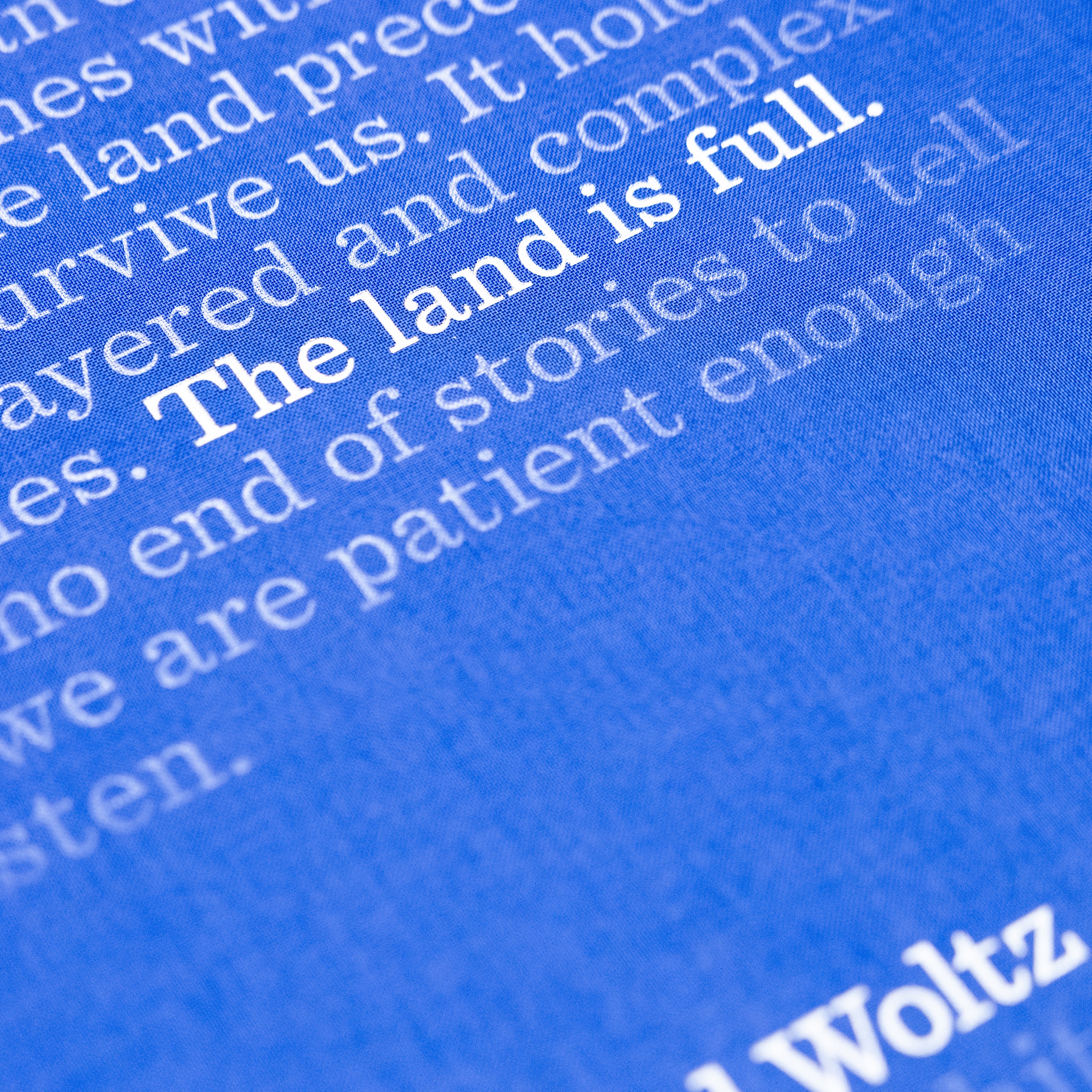 Closeup image of the cover of book The Land is Full