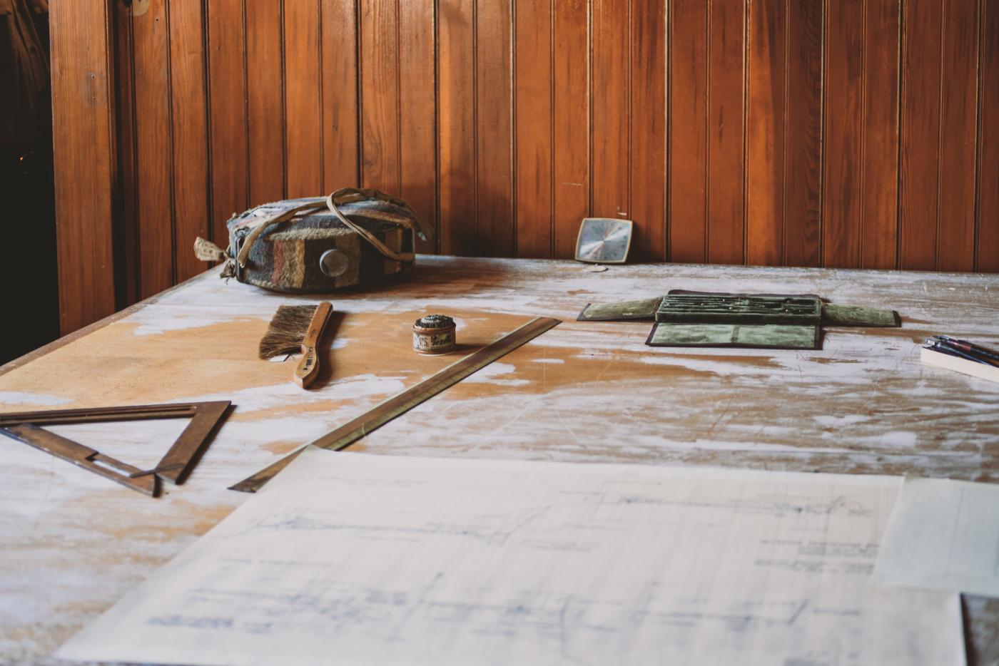 Objects on drafting table in Olmsted Workshop