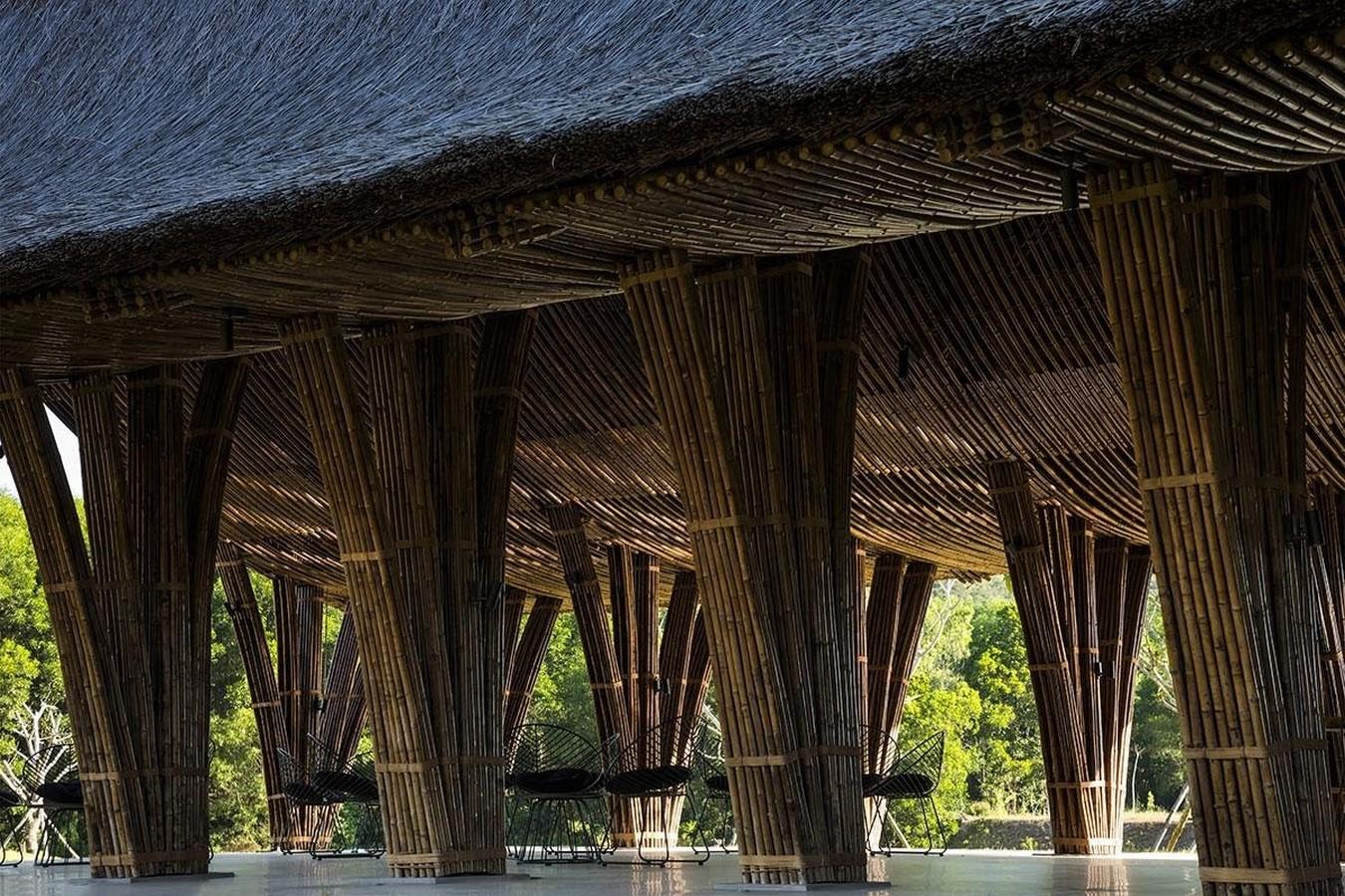 Image of Visitor Center Huong An Vien Cemetery with building columns made of natural materials